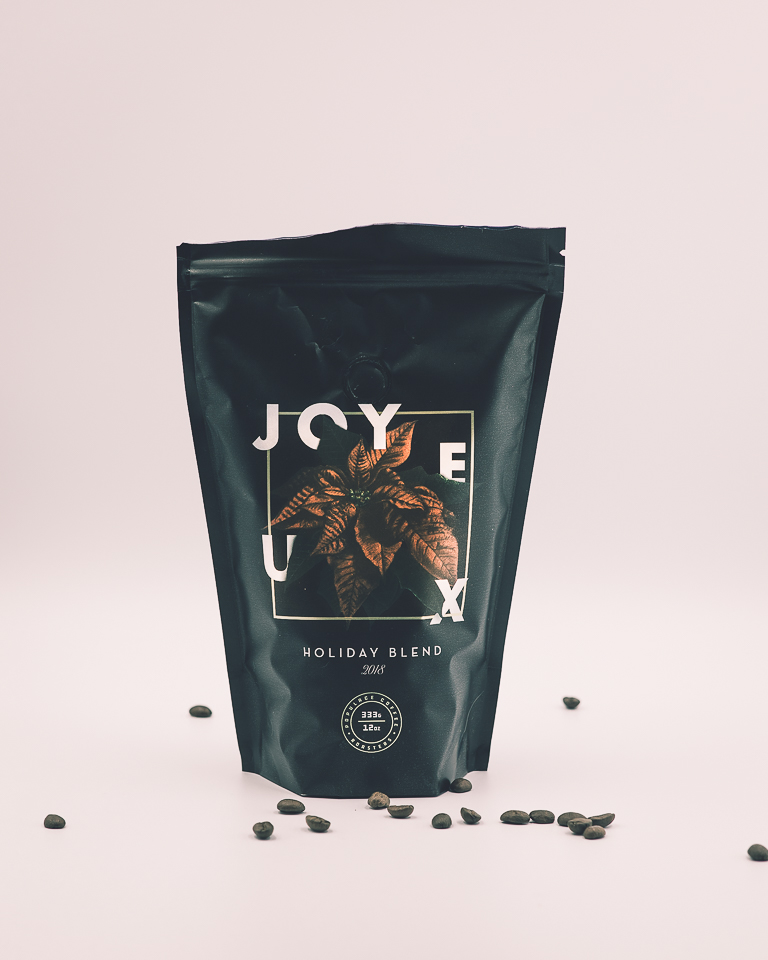 Bag of coffee from Populace coffee. Joyeux holiday blend.